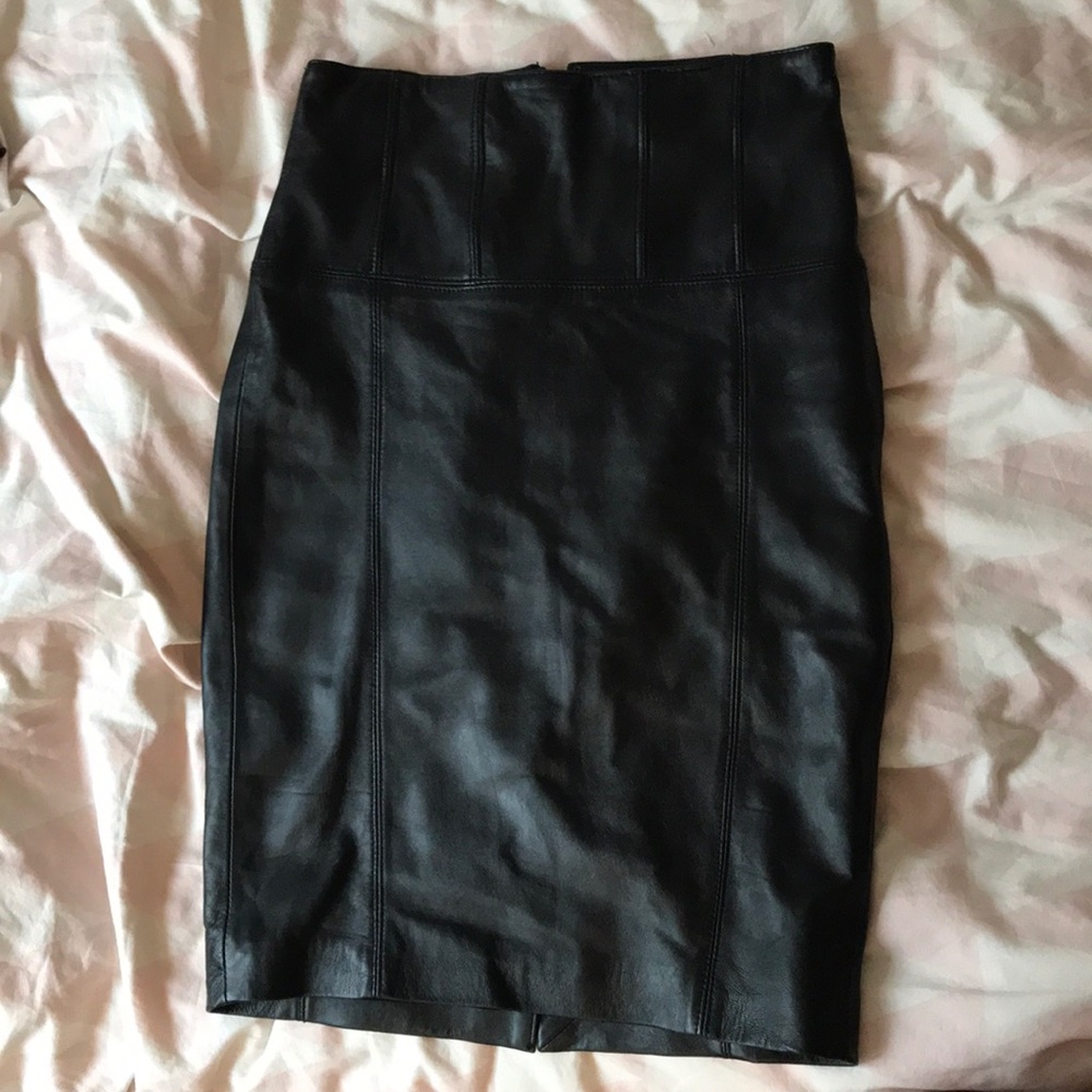 Leather mini with kick pleat and back zip